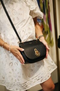 Katherine Ormerod modelling Mulberry bag in black